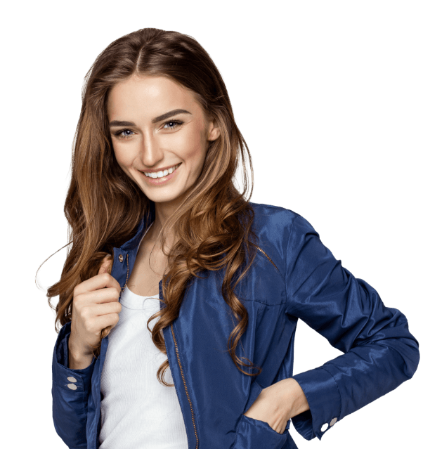 Woman in denim jacket standing and smiling