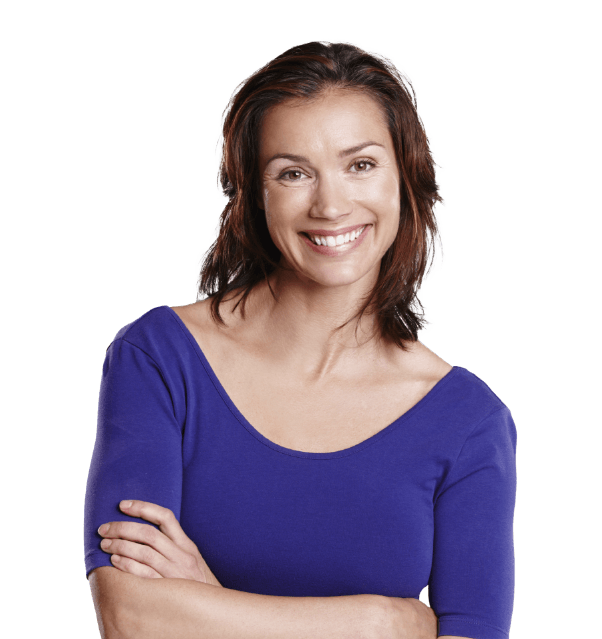 Woman in blue shirt smiling with arms folded