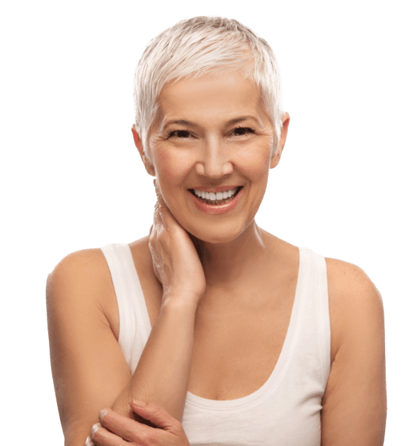 Senior woman in white shirt smiling with dentures in Mesquite