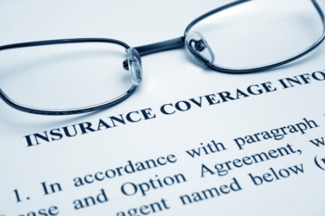 Dental insurance form with glasses