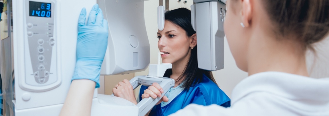 Woman about to have xrays taken at dental office